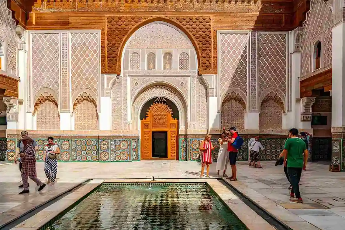 Travelers exploring Morocco during a Marrakech tour with local guide